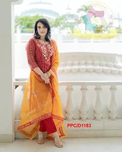 Orange Bandhani Print Cotton Suit With Organza Dupatta