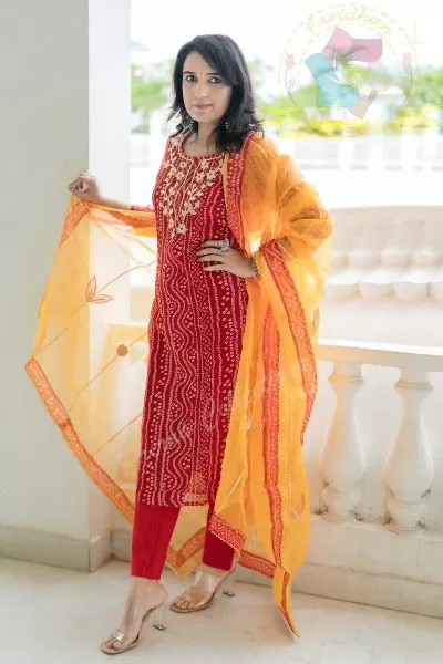 Orange Bandhani Print Cotton Suit With Organza Dupatta